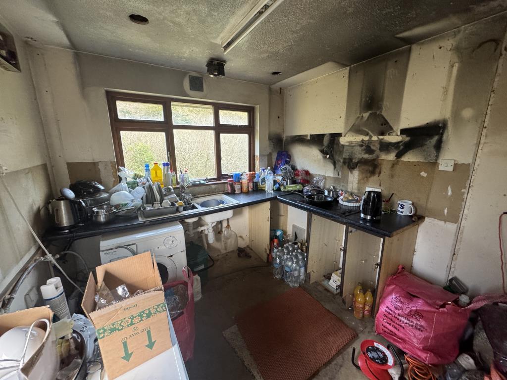 Lot: 63 - DETACHED BUNGALOW ON LARGE PLOT WITH DILAPIDATED BUILDING - View of kitchen